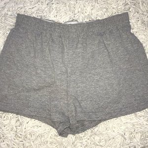 soffe shorts in grey, pink, and black.